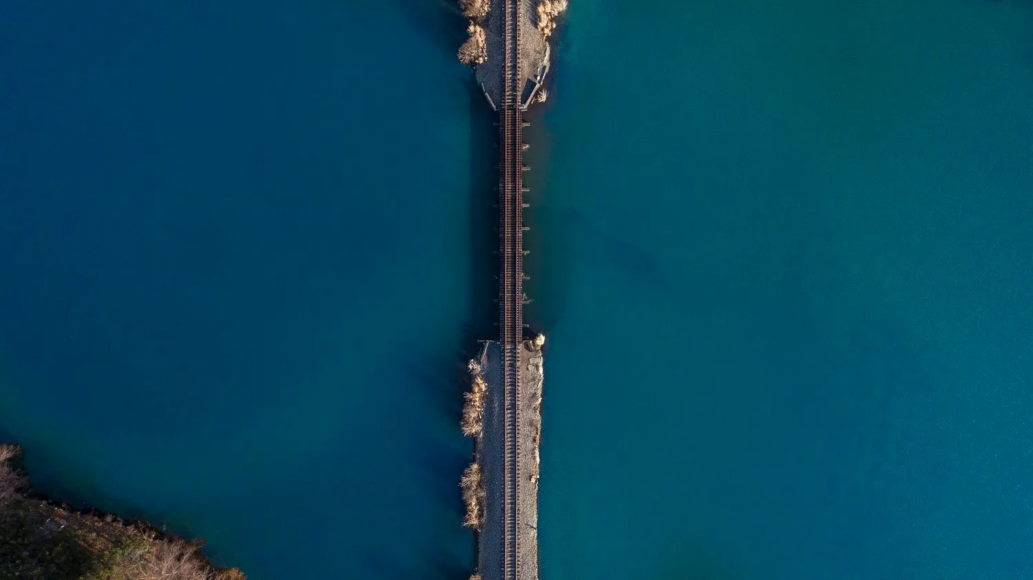 Aerial photograph of a railroad crossing water, 2017